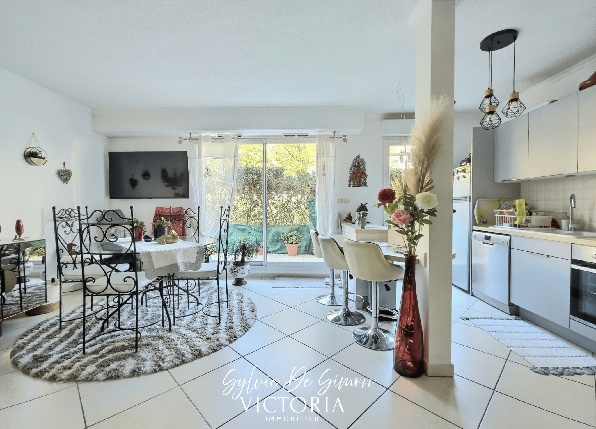 Craquez pour ce joli T3 en rez-de-jardin avec garage!